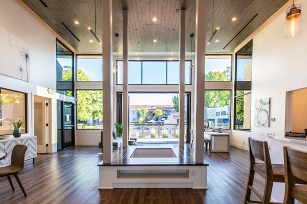 Clubhouse with modern seating and decor at Vicino Apartments
