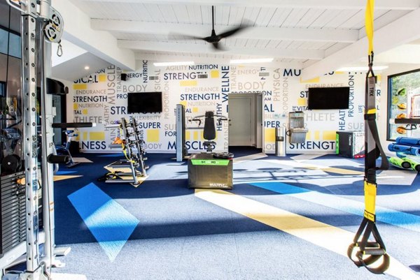 Fitness center with modern equipment at Vicino Apartments for an active lifestyle
