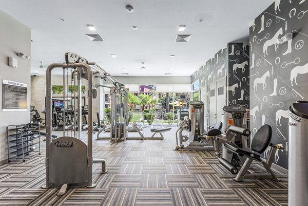 Fitness center with modern equipment at Summerly at Zanjero Apartments, offering a comprehensive workout environment