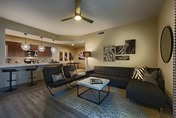 Living room with modern decor at Summerly at Zanjero Apartments