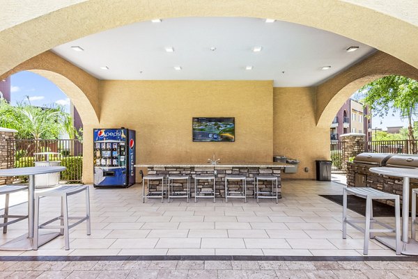 Chic patio with modern seating at Summerly at Zanjero Apartments, perfect for relaxation and outdoor gatherings