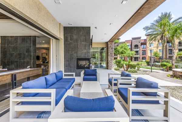 Summerly at Zanjero Apartments: Stylish outdoor patio with modern seating