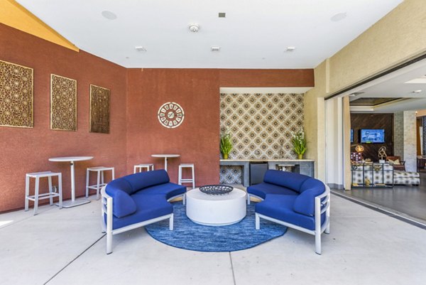 Modern patio with stylish seating at Summerly at Zanjero Apartments