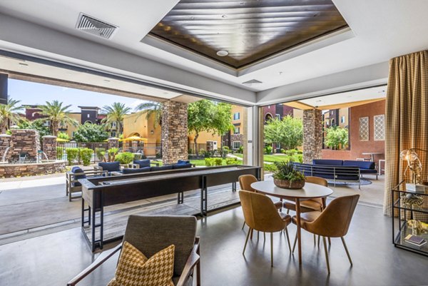 Cozy patio with seating area at Summerly at Zanjero Apartments offering a relaxing outdoor space