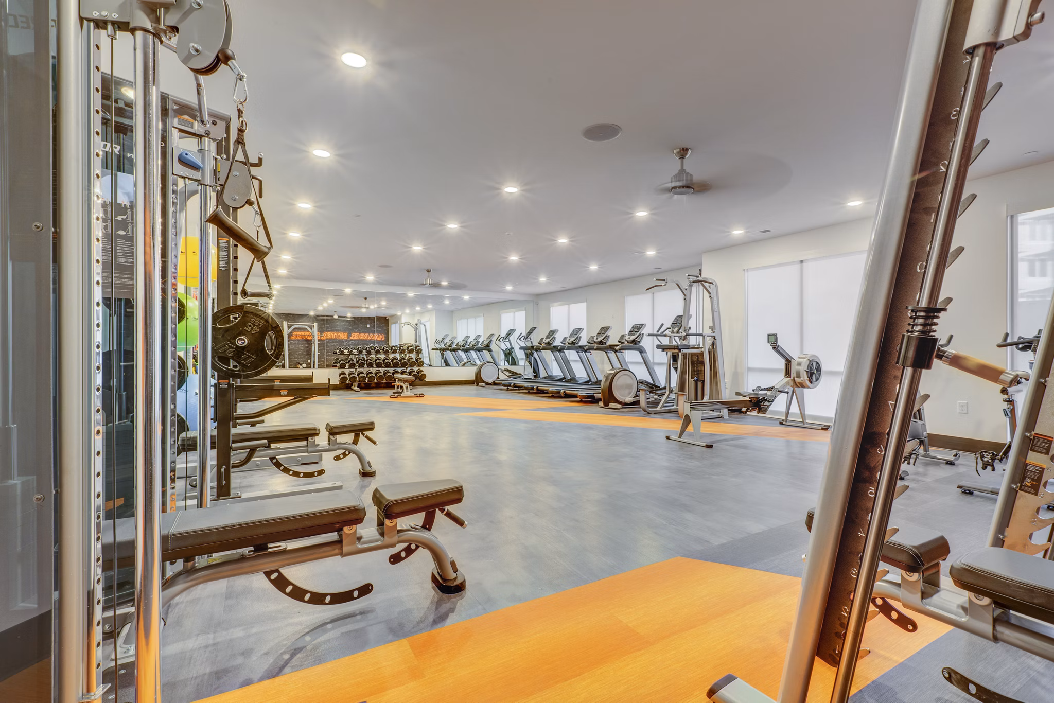 Modern fitness center with state-of-the-art equipment at Anthology Apartments offering luxury amenities for active lifestyles