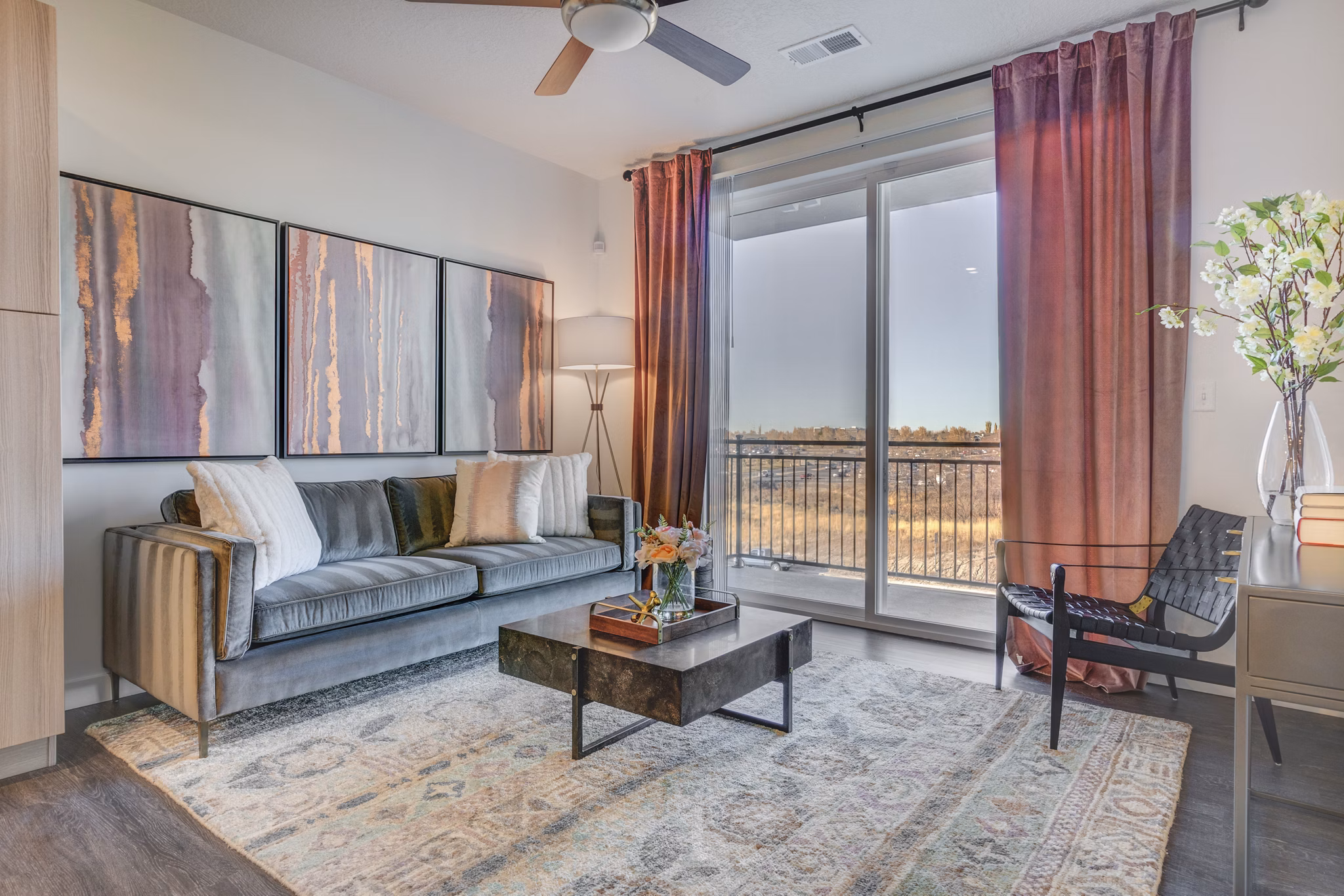 Spacious living room with modern decor in Anthology Apartments, offering luxury living spaces in a vibrant community