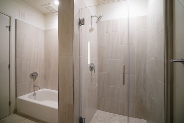 Bathroom featuring modern fixtures and sleek design at 47Hundred Apartments