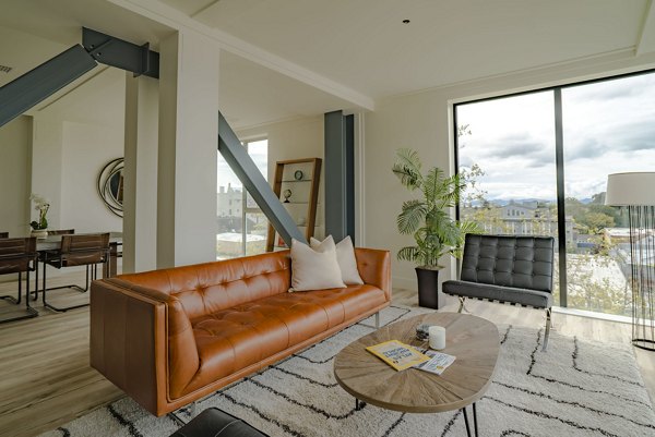 Spacious living room with contemporary furnishings in 47Hundred Apartments