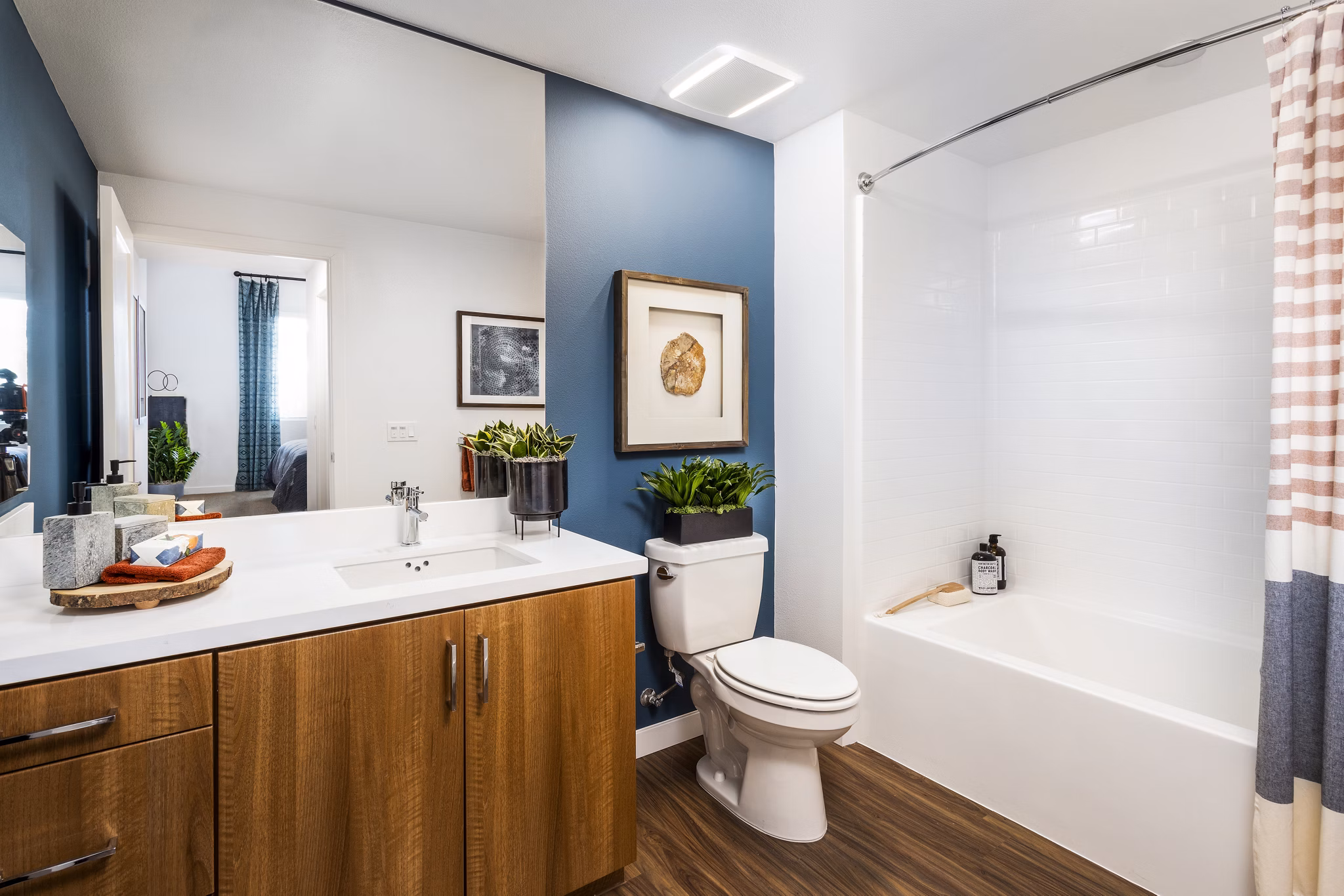 Luxurious bathroom with sleek fixtures and elegant design in Rivue Apartments