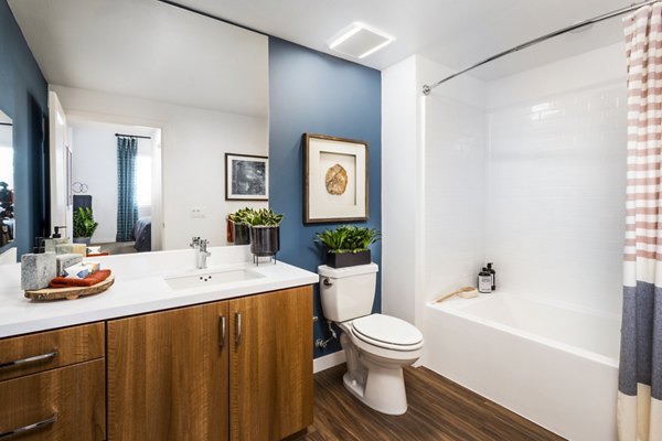 Luxurious bathroom with sleek fixtures and elegant design in Rivue Apartments