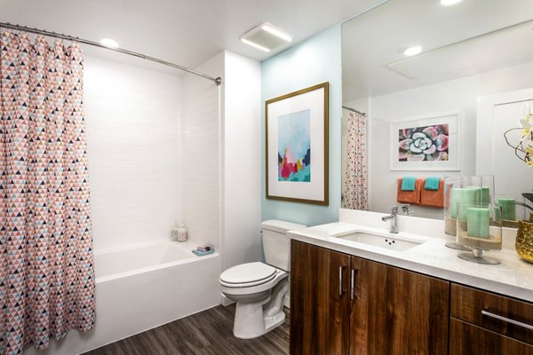 Modern bathroom with elegant fixtures at Rivue Apartments