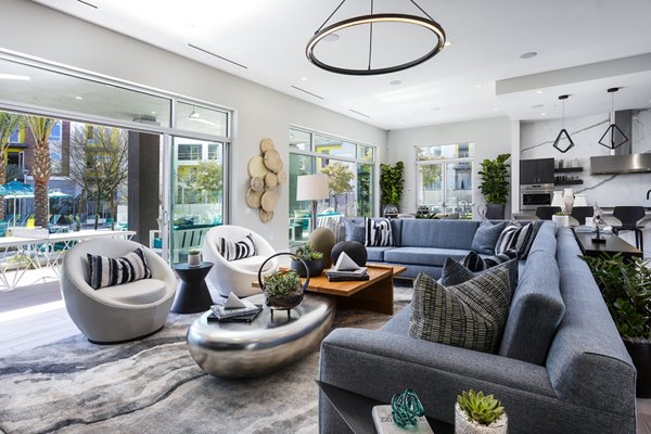 Clubhouse with modern furnishings at Rivue Apartments: Luxury Greystar community amenities