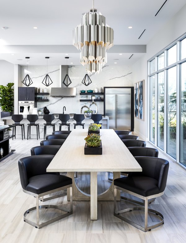 Modern clubhouse with stylish seating and decor at Rivue Apartments, a luxury  community