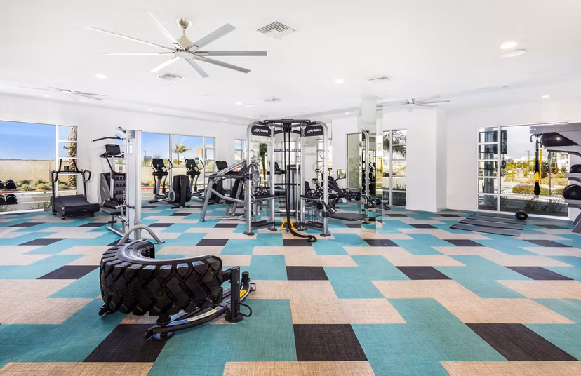 Modern fitness center with state-of-the-art equipment at Rivue Apartments, offering luxury living amenities