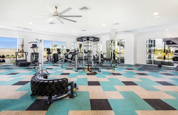 Modern fitness center with state-of-the-art equipment at Rivue Apartments, offering luxury living amenities