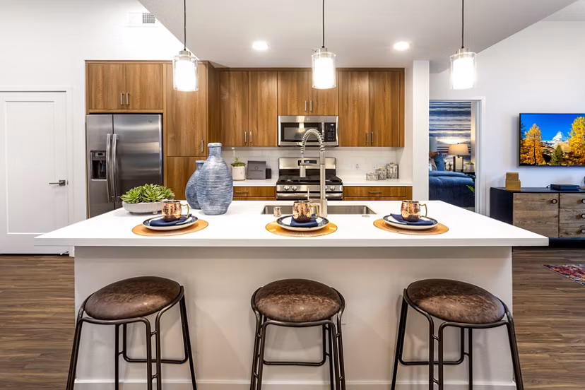 Modern kitchen featuring sleek countertops and stainless steel appliances at Rivue Apartments