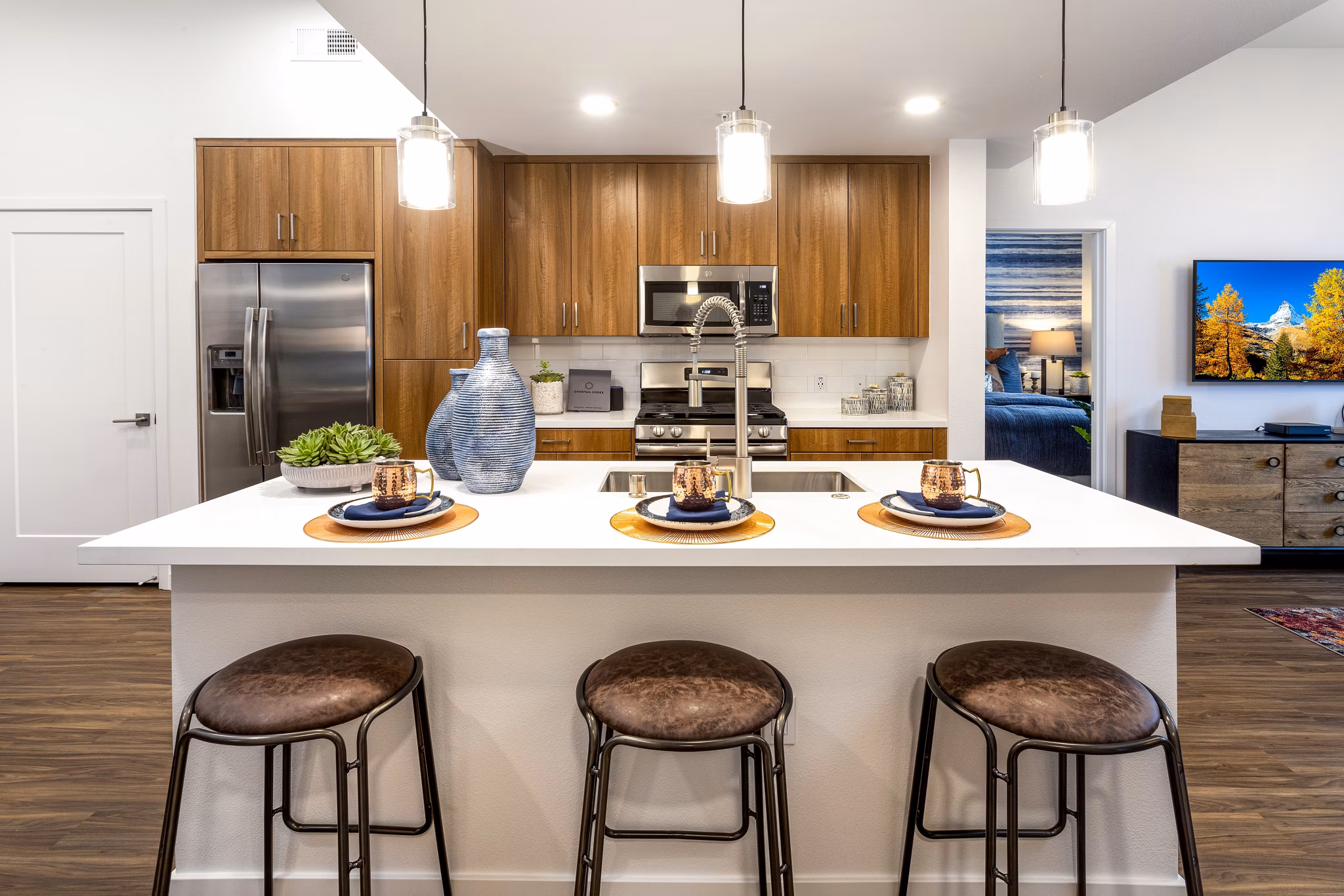 Modern kitchen featuring sleek countertops and stainless steel appliances at Rivue Apartments