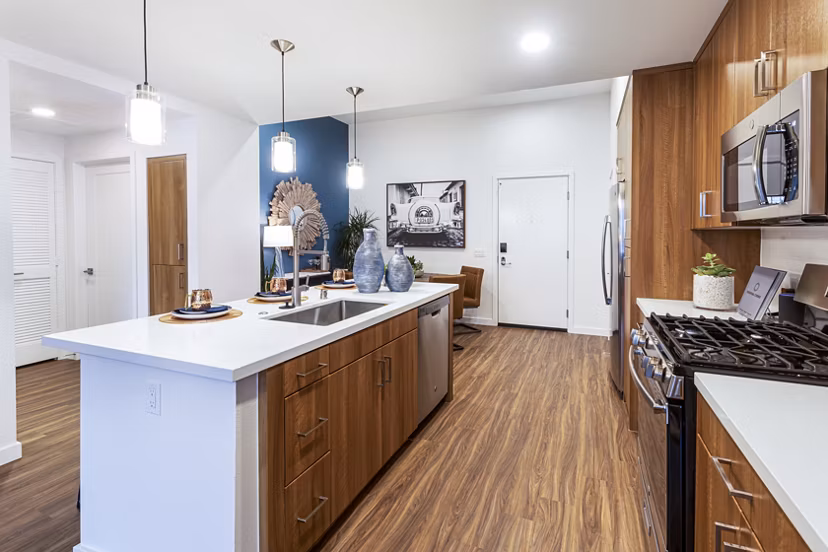 Modern kitchen with sleek appliances in Rivue Apartments offering luxury living