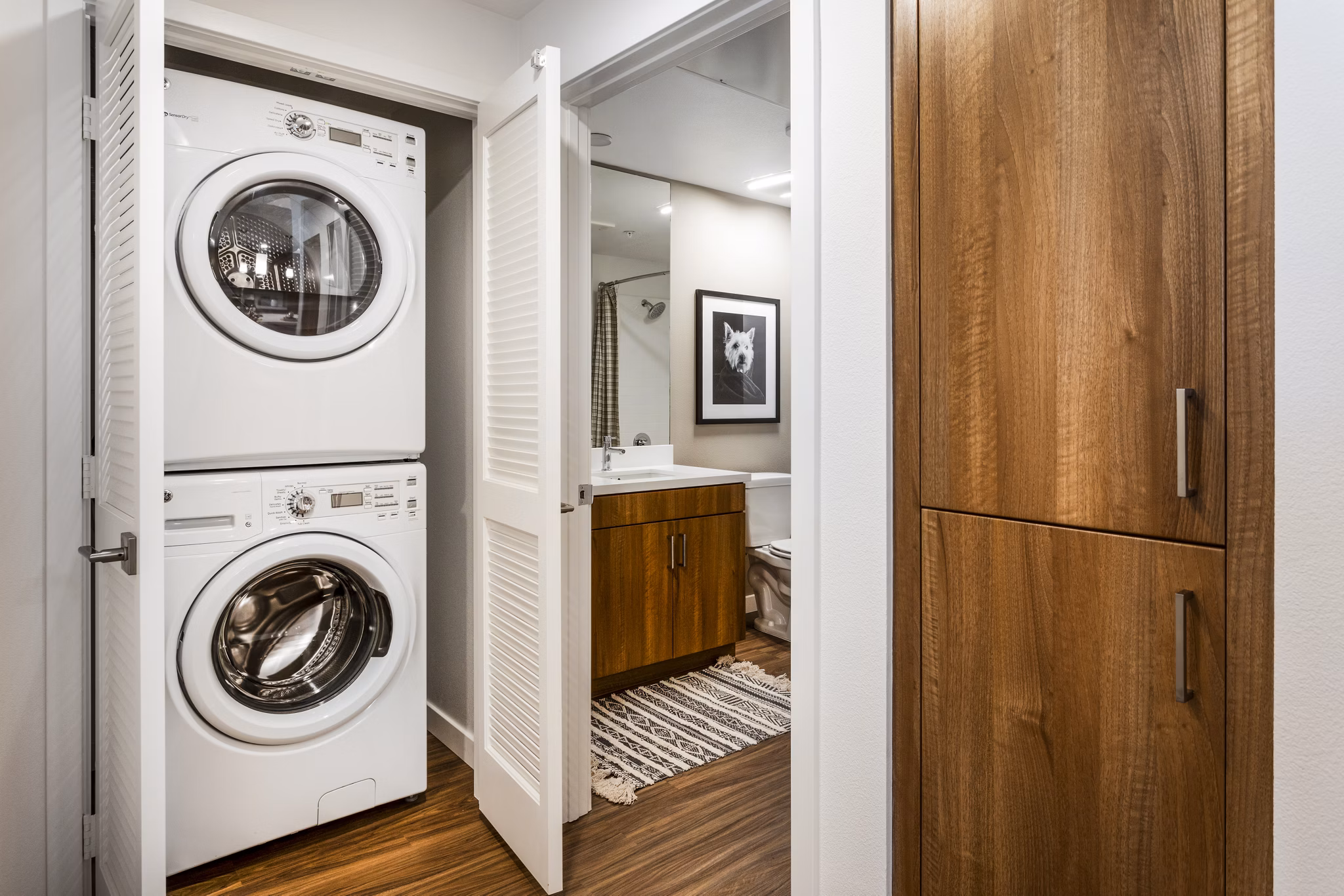 Laundry Room at Rivue Apartments: Modern laundry facilities with energy-efficient washers and dryers in a convenient setting for residents