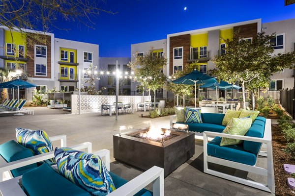 Cozy fire pit area at Rivue Apartments, enhancing outdoor relaxation in Greystar's luxury community