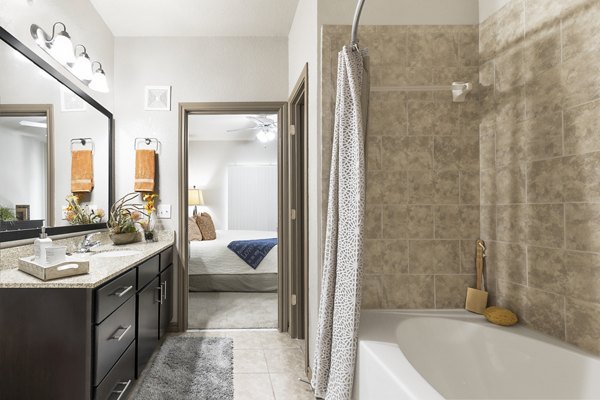 Modern bathroom with sleek fixtures at The Monterra Apartments, featuring luxury amenities for a comfortable living experience