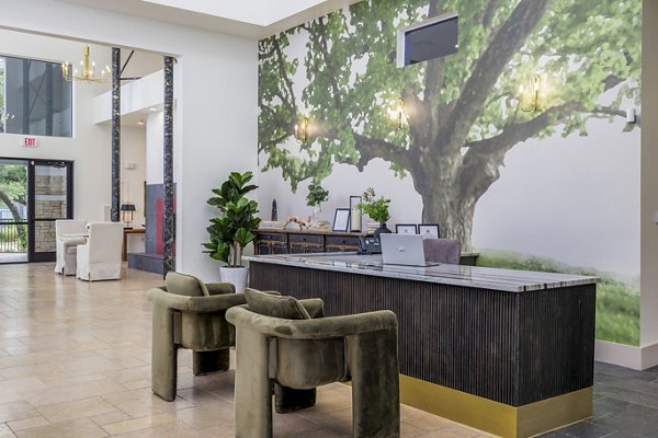 Luxury clubhouse lobby featuring modern decor and seating at The Monterra Apartments