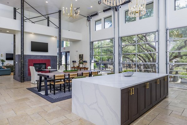 The Monterra Apartments: Modern clubhouse kitchen featuring sleek appliances and inviting seating areas