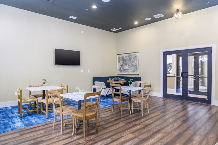 Clubhouse featuring modern lounge areas at The Monterra Apartments, a luxury community by Greystar