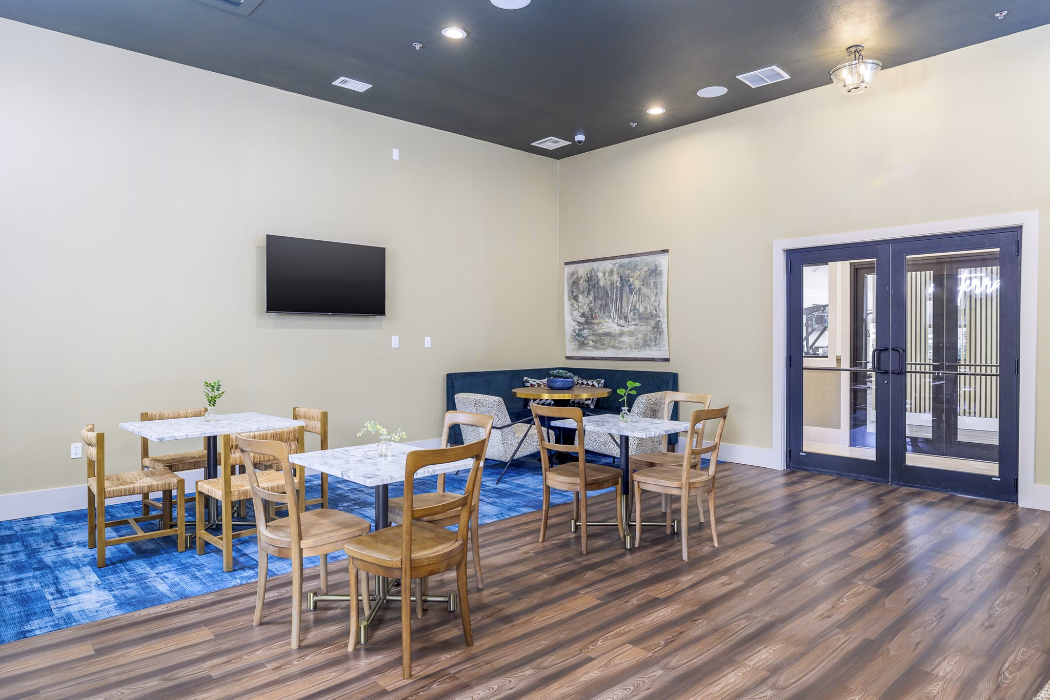 Clubhouse featuring modern lounge areas at The Monterra Apartments, a luxury community by Greystar