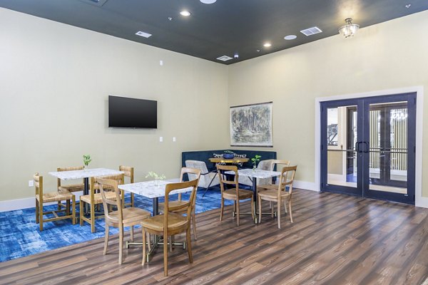 Clubhouse featuring modern lounge areas at The Monterra Apartments, a luxury community by Greystar