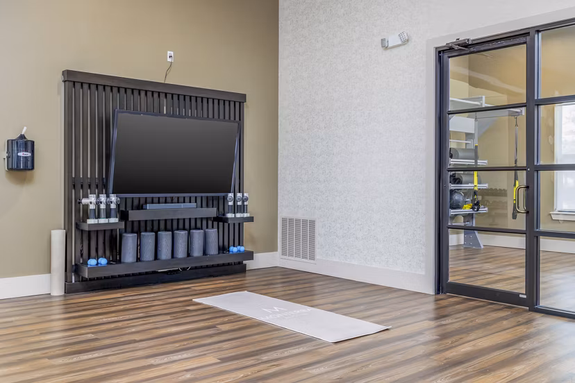 Serene yoga studio with hardwood floors at The Monterra Apartments