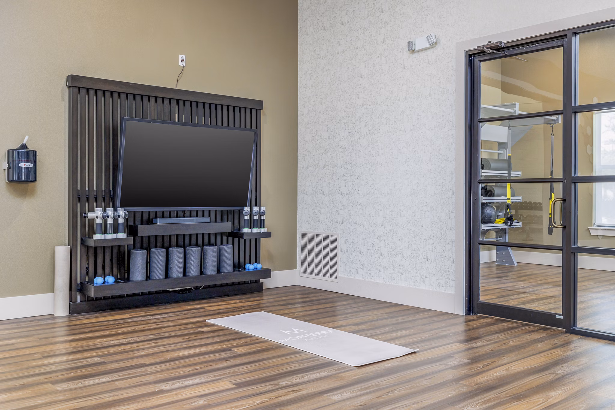 Serene yoga studio with hardwood floors at The Monterra Apartments