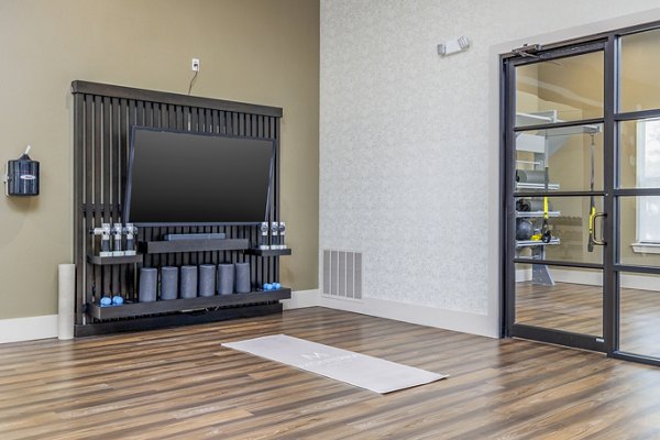 Serene yoga studio with hardwood floors at The Monterra Apartments