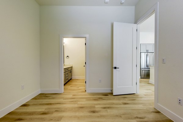 Cozy bedroom with modern decor at The Tobin Estate Apartments