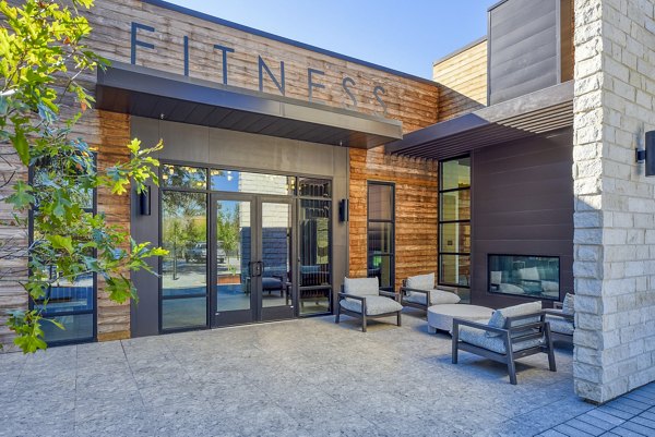 Modern fitness center with state-of-the-art equipment at The Tobin Estate Apartments