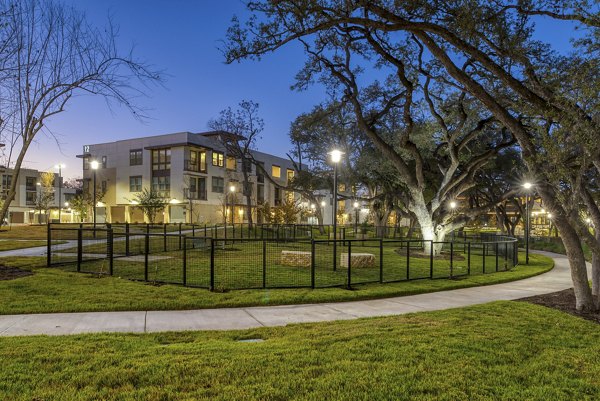 Dog park with agility courses at The Tobin Estate Apartments, a luxury living community in San Antonio
