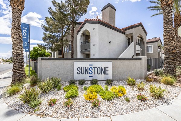 Sunstone Apartments: Modern signage at luxury property in vibrant city location