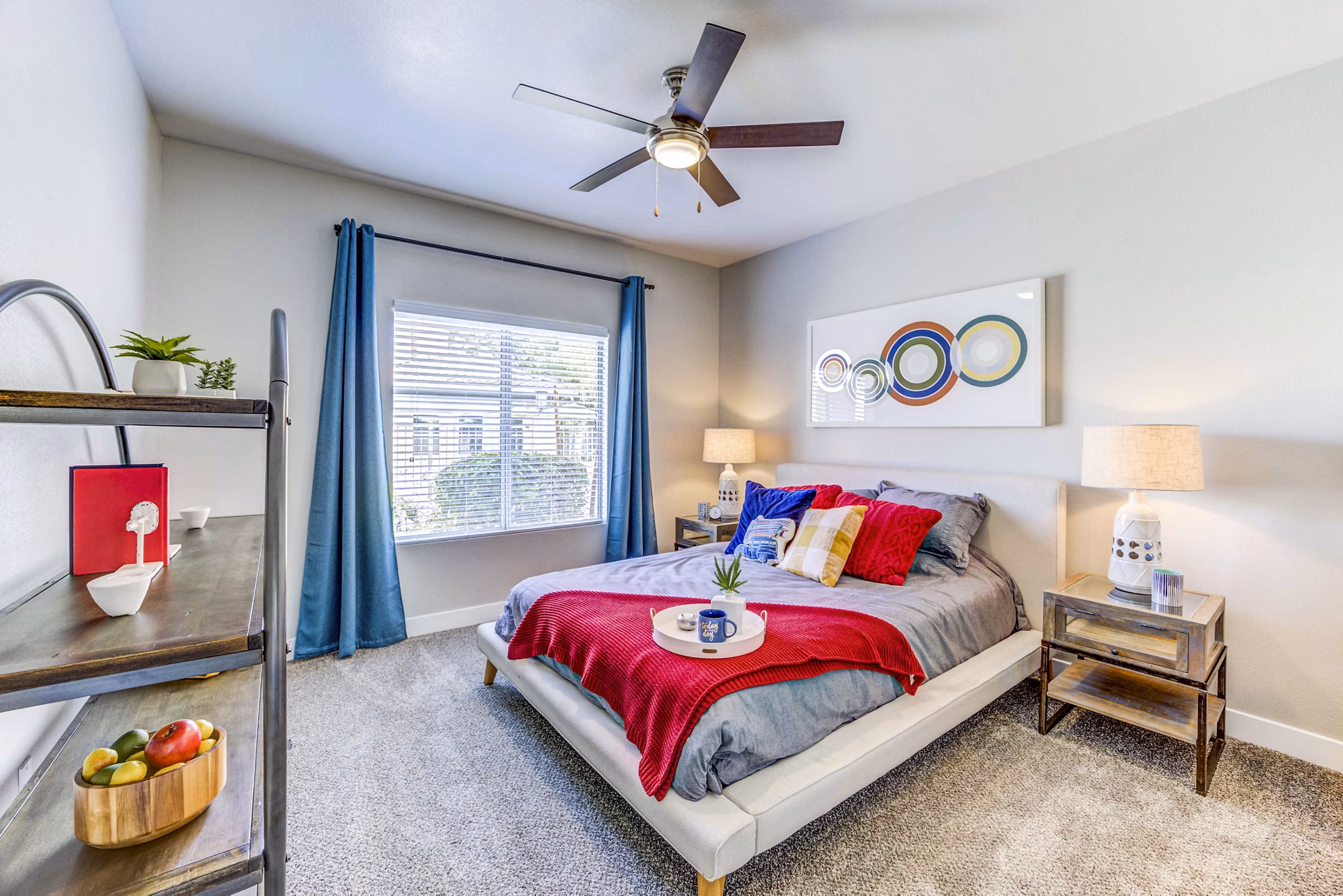 Inviting bedroom with modern decor at Sunstone Apartments, offering luxury living spaces by Greystar