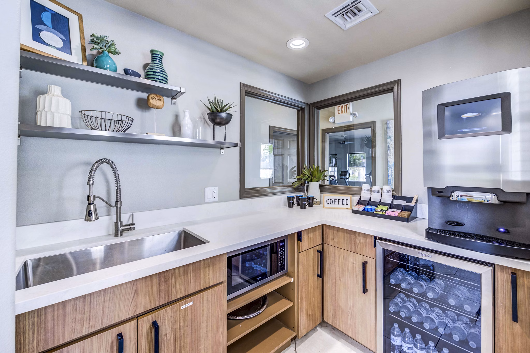 Elegant clubhouse with modern furnishings at Sunstone Apartments, offering luxury spaces in a premier location