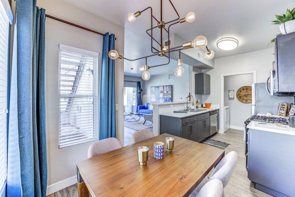 Elegant dining room with modern decor at Sunstone Apartments in Las Vegas, NV.
