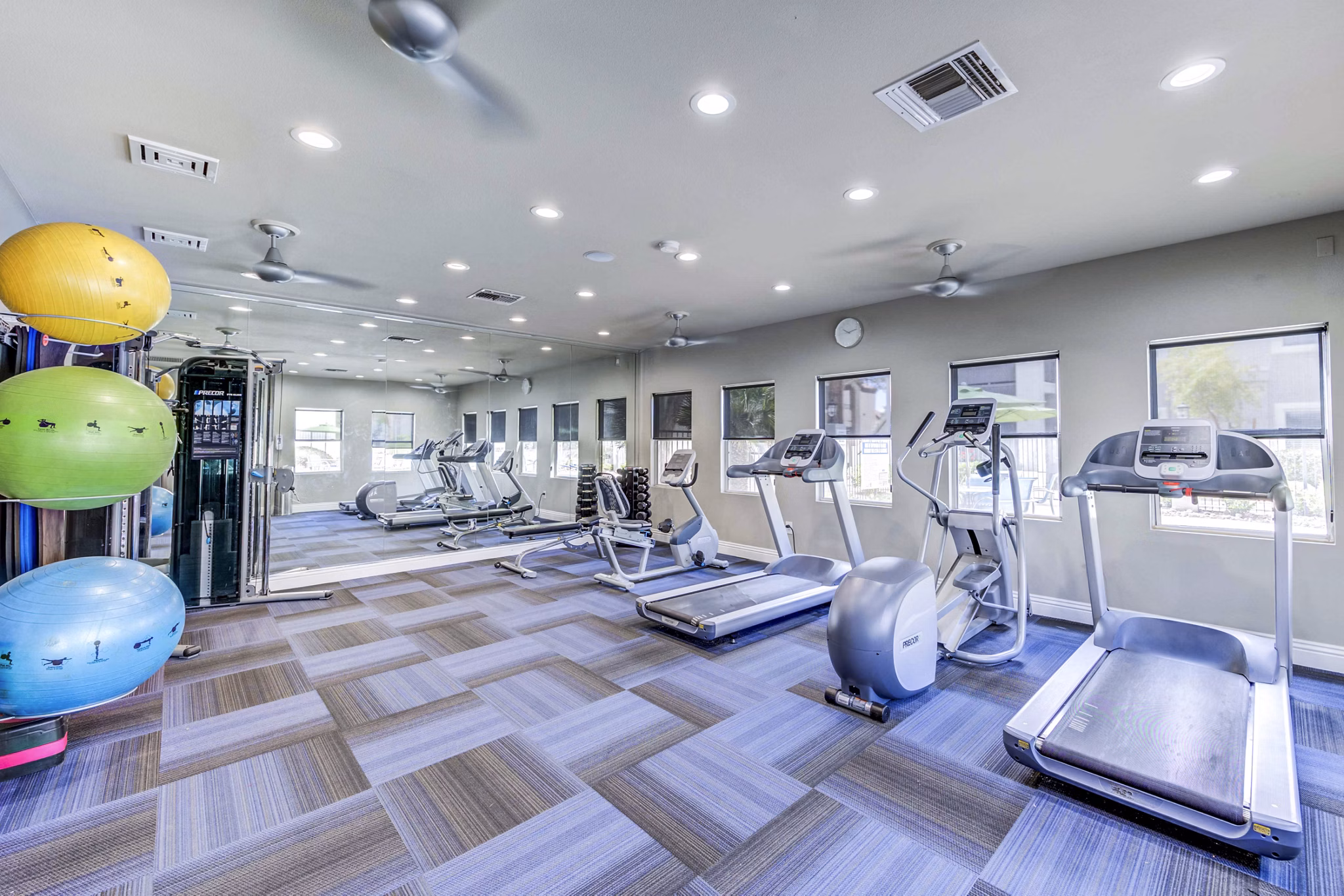 State-of-the-art fitness center with modern equipment at Sunstone Apartments, ideal for active living and wellness