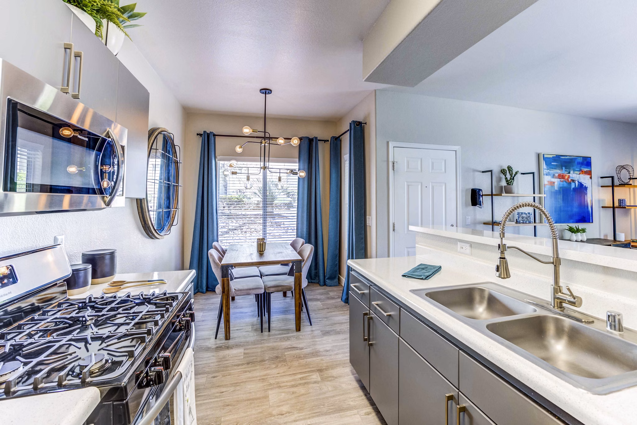 Spacious kitchen with modern appliances in Sunstone Apartments