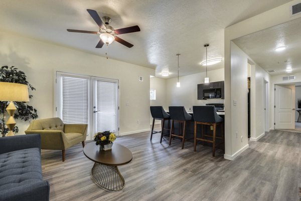 Modern hallway with sleek lighting fixtures at Central Park Commons Apartments, offering luxury living near amenities and attractions