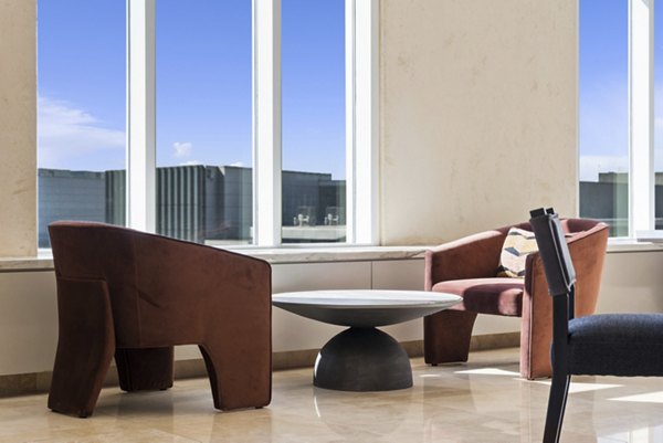 Clubhouse featuring modern decor and communal seating at 717 Olympic Apartments, a luxury property by Greystar in downtown Seattle