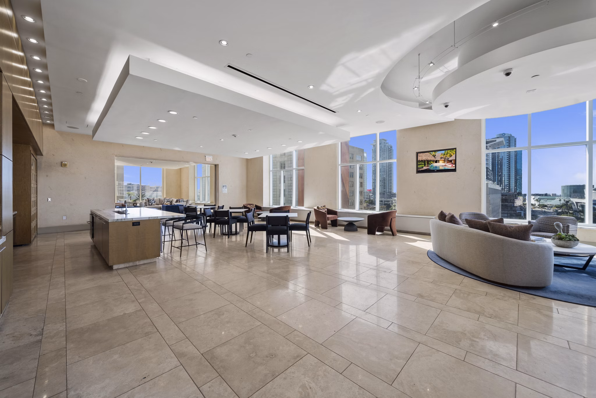 Modern clubhouse with lounge seating at 717 Olympic Apartments