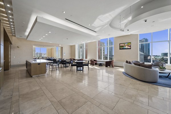 Modern clubhouse with lounge seating at 717 Olympic Apartments