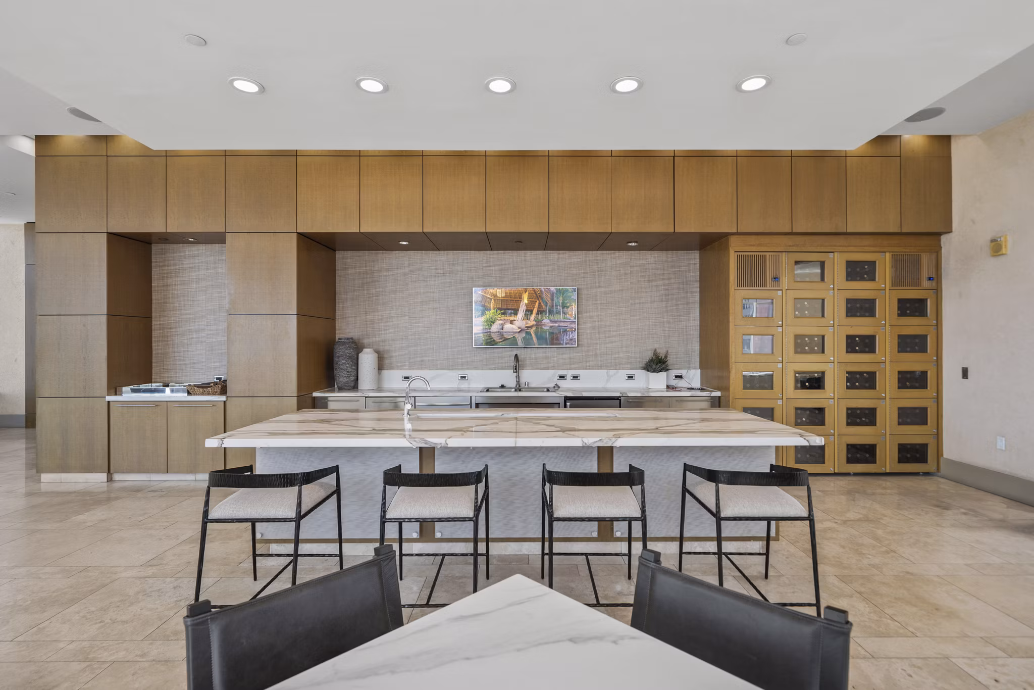 Clubhouse featuring modern seating and stylish decor at 717 Olympic Apartments in Los Angeles