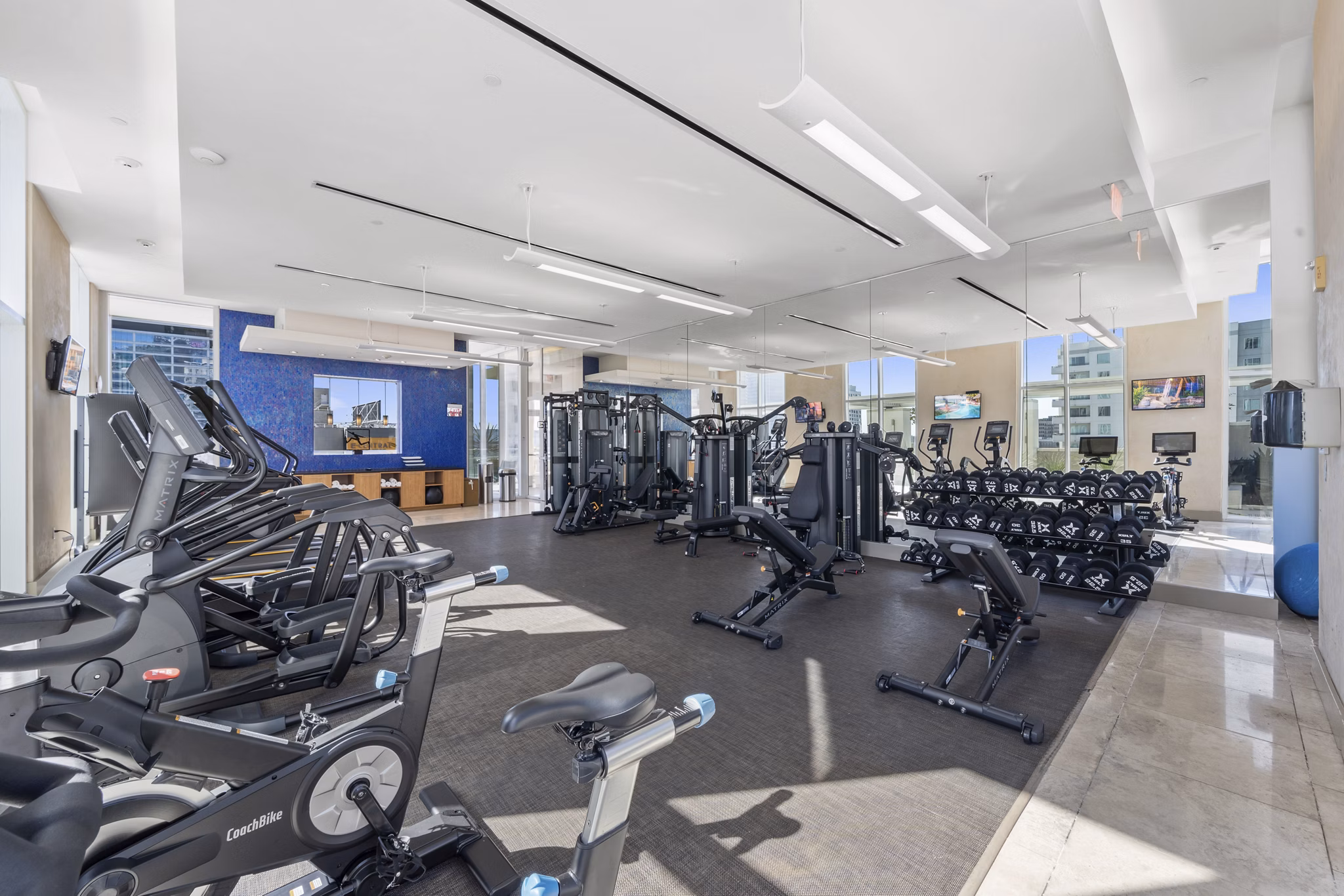 State-of-the-art fitness center with modern equipment at 717 Olympic Apartments