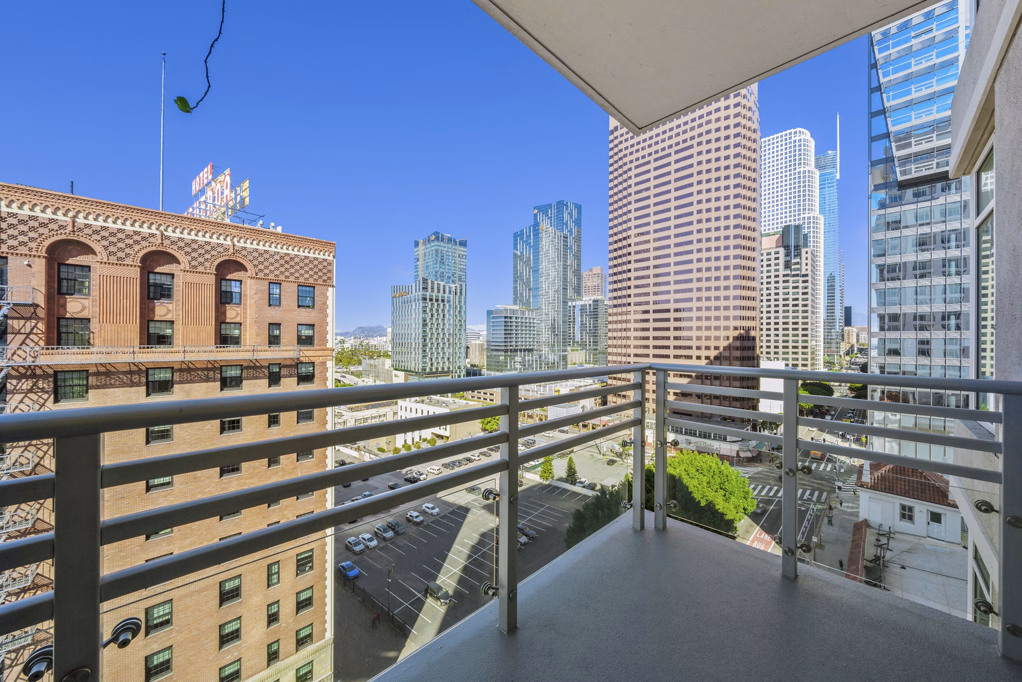 Outdoor patio with modern seating at 717 Olympic Apartments in downtown Seattle, perfect for relaxing or entertaining guests