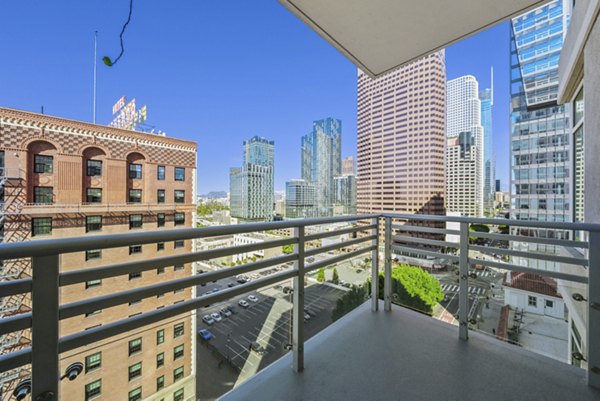 Outdoor patio with modern seating at 717 Olympic Apartments in downtown Seattle, perfect for relaxing or entertaining guests
